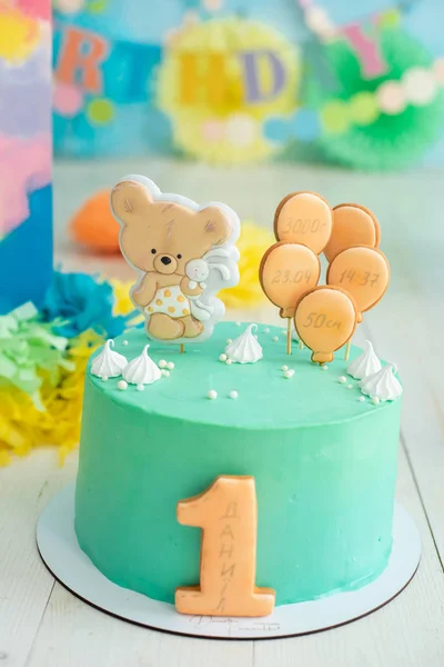 First birthday cake on festive decorative background
