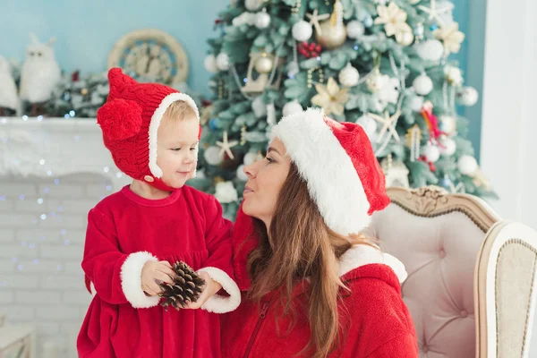 Mother Sitting Armchair Having Fun Little Daughter Red Party Costume — Stock Photo, Image