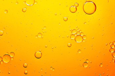 oil with bubbles on coral background. Orange Abstract space background. Soft selective focus. macro of oil drops on water surface. copy space. air bubbles in water clipart