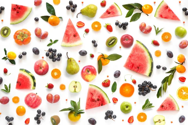 Creative flat layout of fruits in the form of a pattern, top view. Food background