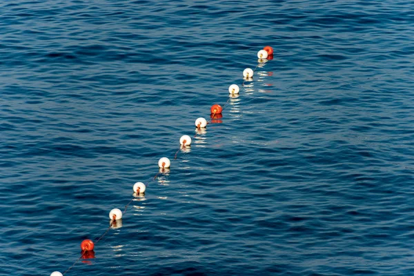 Row Orange White Buoys Surface Water Mediterranean Sea Italy — Stock Photo, Image