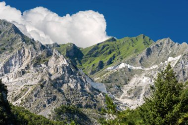 Marble quarries (Carrara white marble) in the Apuan Alps (Alpi Apuane). Tuscany, Italy, Europe clipart