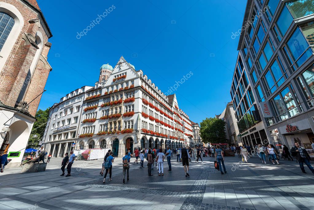 MUNICH, GERMANY - SEPT 6, 2018: Building Zum Schonen Turm (The beautiful tower) Hirmer company fashion store in Kaufinger strasse near Marienplatz. Munich, Germany