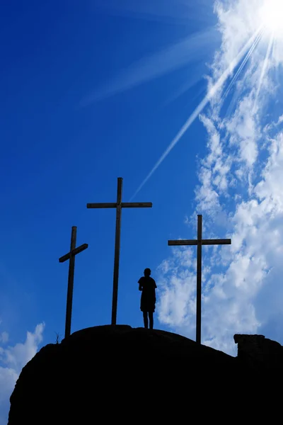 Silhouette Three Crosses Hill Boy Praying Blue Sky Clouds Sun — Stock Photo, Image