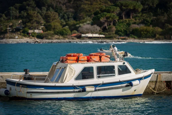 Small White Blue Motor Boat Orange Lifebelts Top Moored Port — Stock Photo, Image