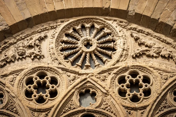 Architectural detail of the church of Orsanmichele in gothic style (1337-1380) in Florence downtown. Tuscany, Italy, Europe.