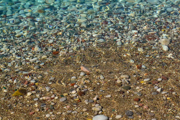 Beautiful sea view. A calm sea by the shore. Clean pebble beach. The Adriatic. Montenegro