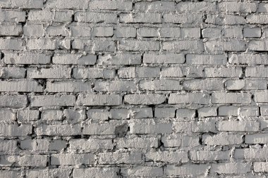 Modern tasarım tarzı dekoratif engebeli beyaz renk eski tuğla duvar deseni. Close.