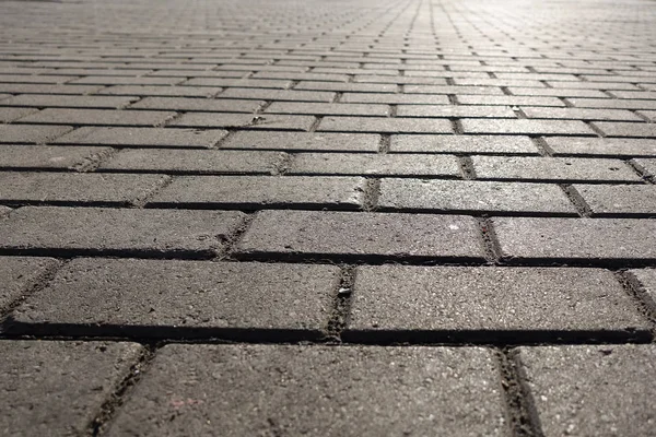 Una parte del sendero. Calle baldosas pavimento de piedra. Antecedentes para el diseño . — Foto de Stock