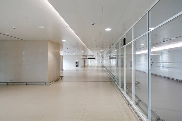 Modern architecture, a large empty light corridor.