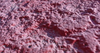 Beton duvar kırmızıya boyanmış. Soyut arka plan. Seçici odaklama.