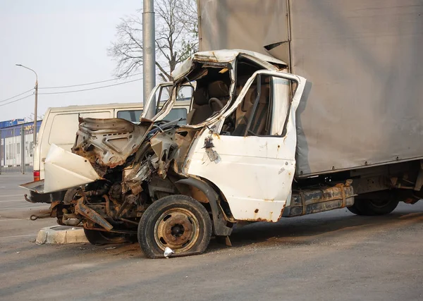 Cargo van broken in a road accident. Russia. Frontal collision