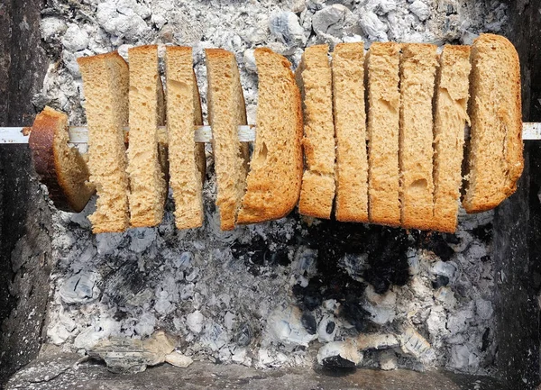 Russian way to grill bread on the coals