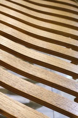 Yarı dairesel, açık iş tasarımı olan ahşap tahtaların soyut arkaplanı