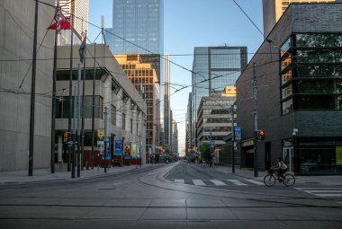 Empty street without people. Quarantine city Toronto buildings, skyscraper, downtown. Evening time, sunset
