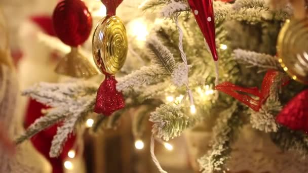 Young Woman Touches Branches Decorated Christmas Tree Her Hand Closeup — Stock Video