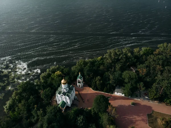 Aerial photography of a landscape with a church and a river. — Stock Photo, Image