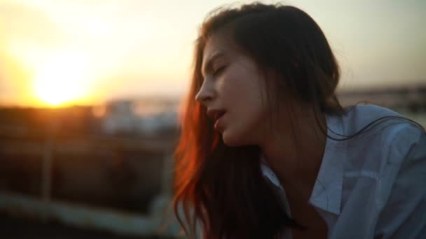 Young Woman Loose Hair Closed Eyes Sings Song White Shirt — Stock Video