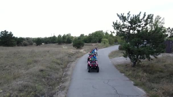 Three Men Quad Bikes One Man Racing Motorcycle Ride Road — Stock Video
