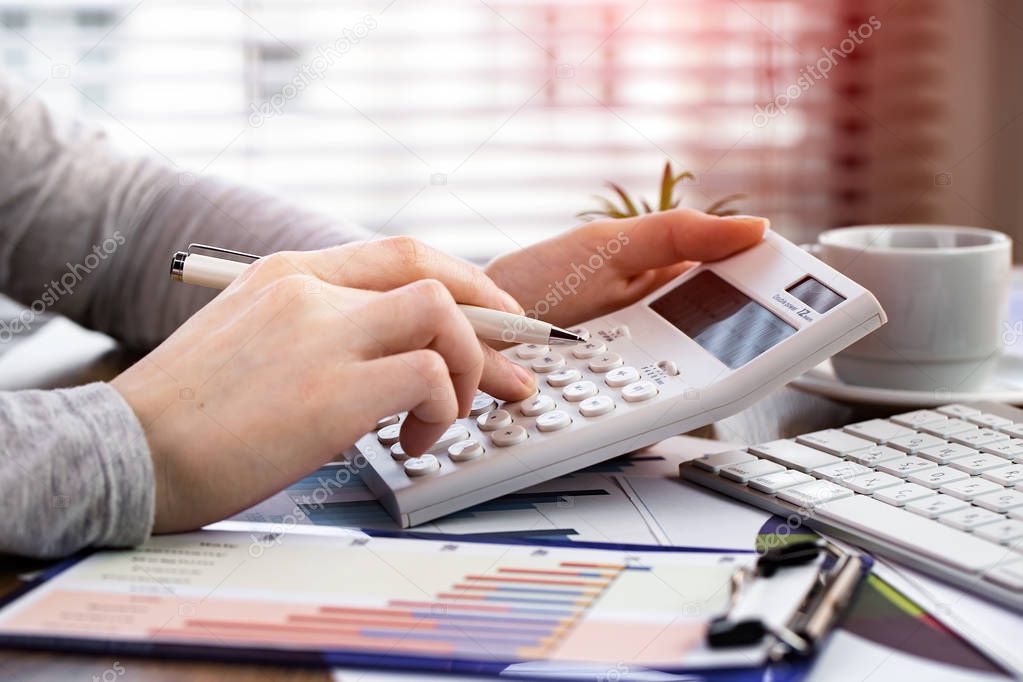 Female hands with items for business