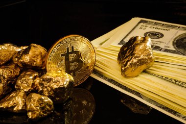 Külçe altın ve dolar faturaları iş kavramı bitcoin