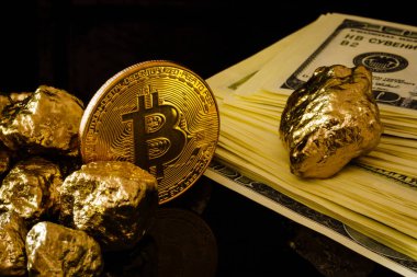 Külçe altın ve dolar faturaları iş kavramı bitcoin