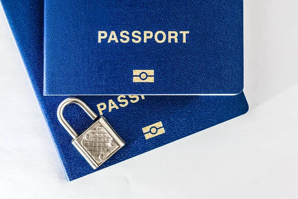 Two Passports Blue White Background Closed Lock — Stock Photo, Image