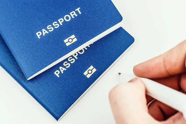 Passengers Filling Immigration Form Table Passport Pen Male Traveler — Stock Photo, Image