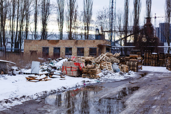 Broken wood pallet outdoors in autumn