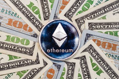 Ethereum crypto currency on dollar banknotes  clipart