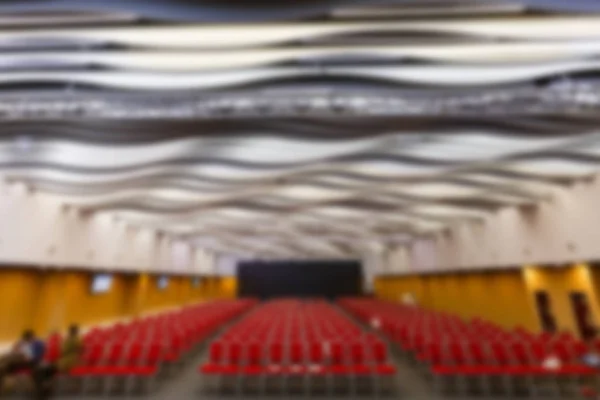 Blur of business conference and presentation in conference hall