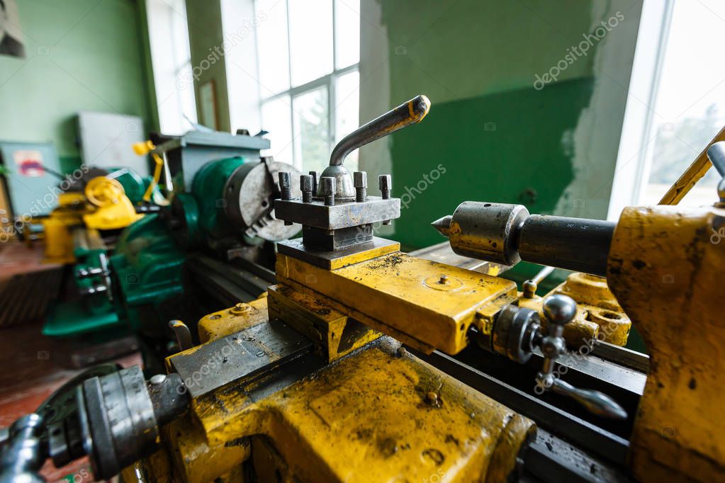Old and dirty lathe machine.