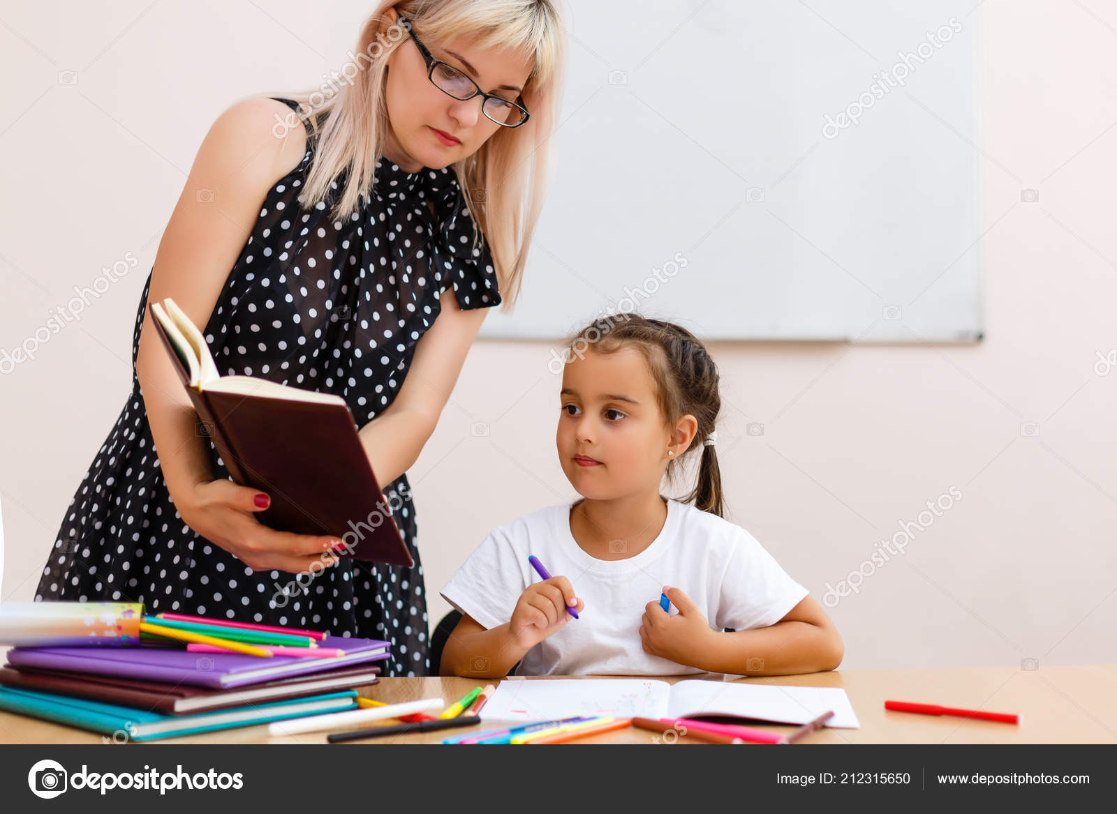 The teacher and a small girl