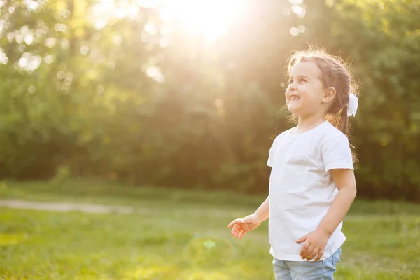 Carefree Child Running Jumping Green Summer Meadow Catching Soap Bubbles — Stock Photo, Image
