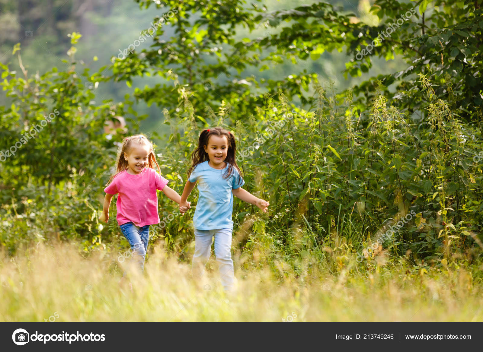 Girls Running Holding Hands Green Park 