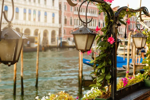 Lantern by cafe on a Grand Canal Venice Italy