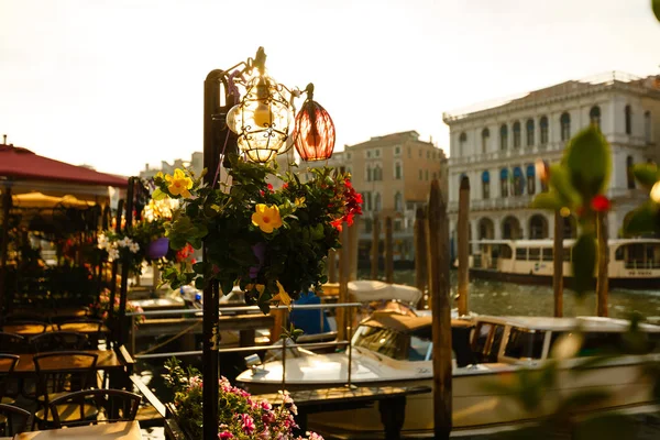 Lantern by cafe on a Grand Canal Venice Italy