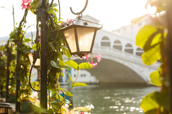 Lantern by cafe on a Grand Canal Venice Italy