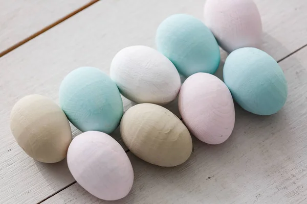 Mucchio Uova Pasqua Colori Pastello Tavole Legno Chiaro — Foto Stock