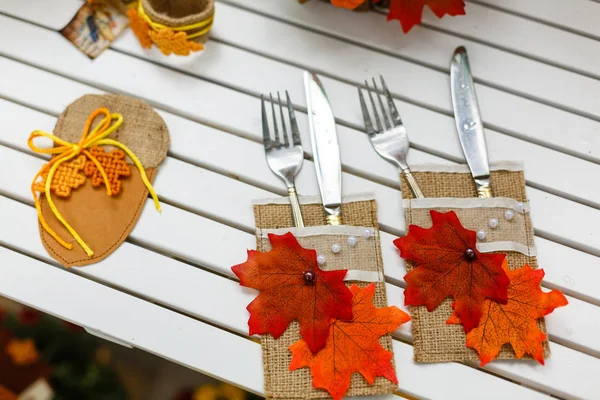 Dining Utensils Forks Knifes Serving Wooden Table Decorated Autumn Leaves — Stock Photo, Image