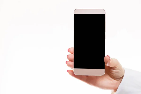 白色背景下隔离的女性手持手机 — 图库照片