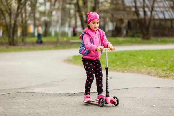 Little Girl Riding Scooter Smartphone Playground — Stock Photo, Image