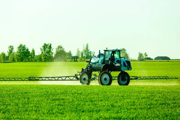 self-propelled sprayer with GPS-navigation herbicides handle spring field