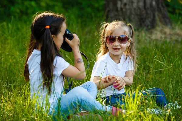 Two Little Girls Playing Camera Green Park Stock Photo by ©sinenkiy ...