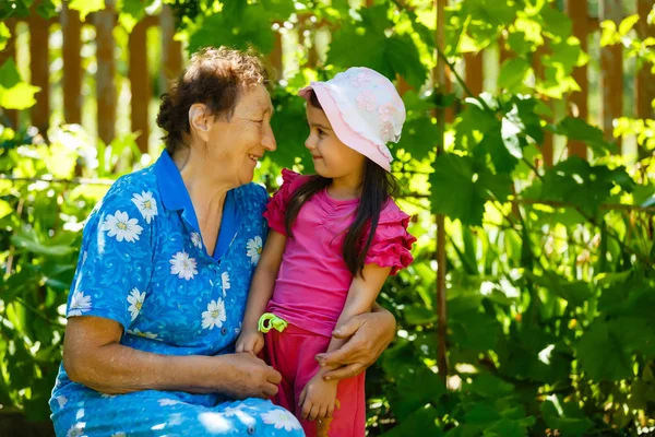 Happy Grandmother Granddaughter Resting Green Garden — Stock Photo, Image