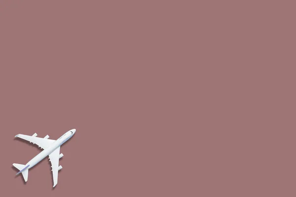 Postava Letadla Růžovém Pozadí — Stock fotografie