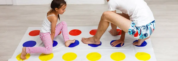 Little Girl Plays Twister Home — Stock Photo, Image