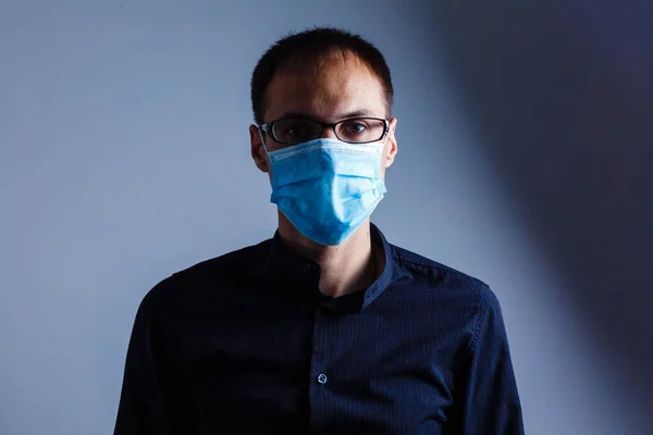 man in a protective mask, the H1N1 Virus