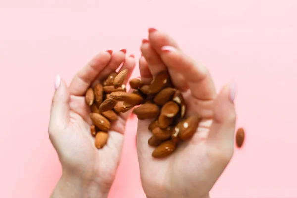 Image Hands Holding Hazelnuts Pink Background — Stock Photo, Image