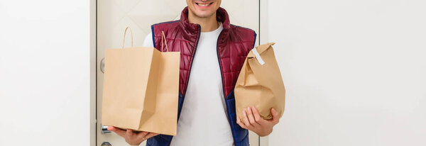 Fast delivery service manager bringing package to female client